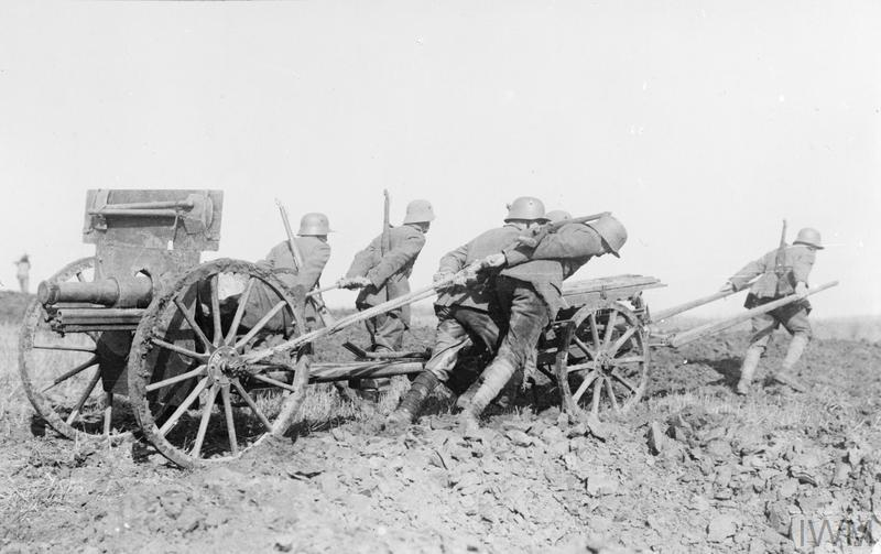 WWI German stormtroopers pulling field gun